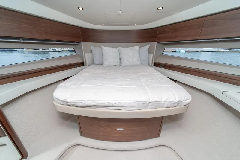 Slide: The Image of Luxurious bedroom interior of 2024 Princess F45 yacht with panoramic windows. - 35