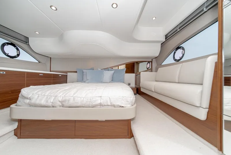 Slide: The Image of Luxurious bedroom interior of 2024 Princess F45 yacht with modern design and elegant furnishings. - 38