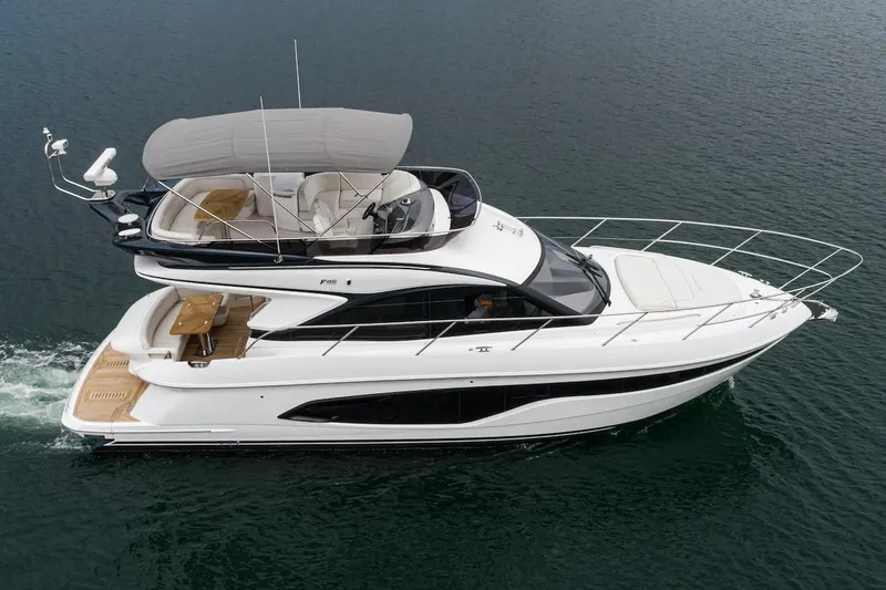 Slide: The Image of 2024 Princess F45 yacht cruising on open water. - 4