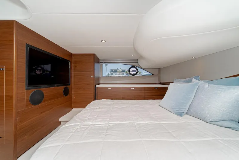 Slide: The Image of Luxurious bedroom interior of 2024 Princess F45 yacht with modern wood finishes. - 40
