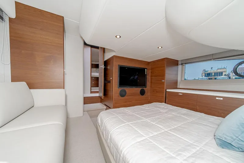 Slide: The Image of Luxurious bedroom interior of 2024 Princess F45 yacht with modern furnishings and large window. - 41