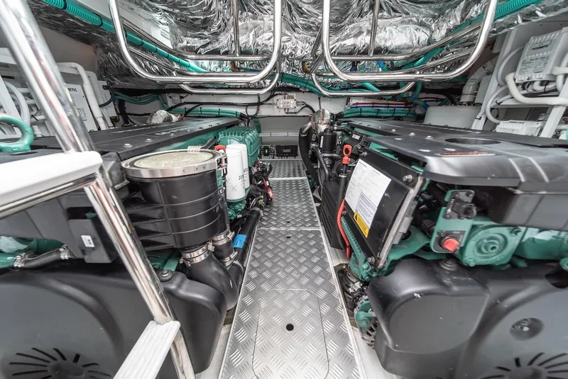 Slide: The Image of Engine room of a 2024 Princess F45 yacht with dual engines and advanced wiring. - 45