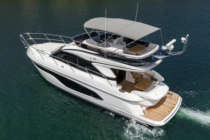 Slide: The Image of 2024 Princess F45 yacht cruising on water, aerial view. - 6