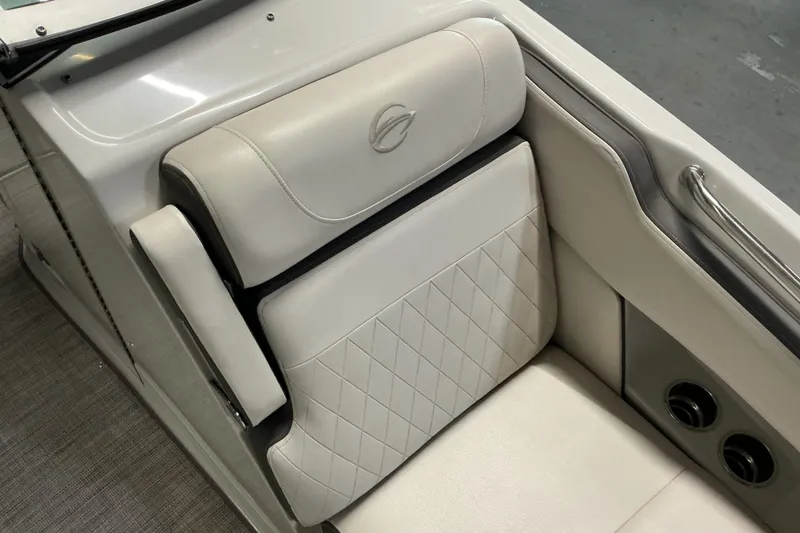 Slide: The Image of 2021 Crownline Eclipse E255 boat seat with diamond-stitched upholstery and armrest. - 26