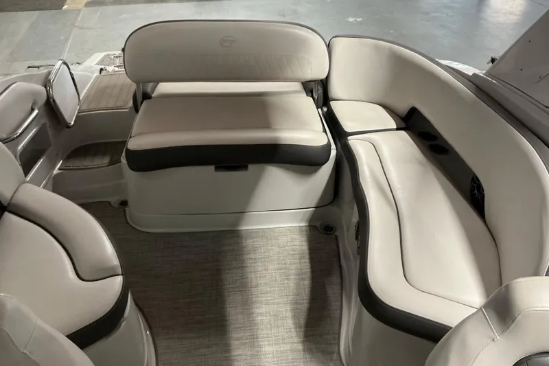 Slide: The Image of 2021 Crownline Eclipse E255 boat interior with luxurious seating arrangement. - 29