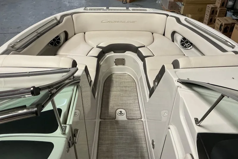 Slide: The Image of 2021 Crownline Eclipse E255 boat interior with plush seating and modern design. - 32