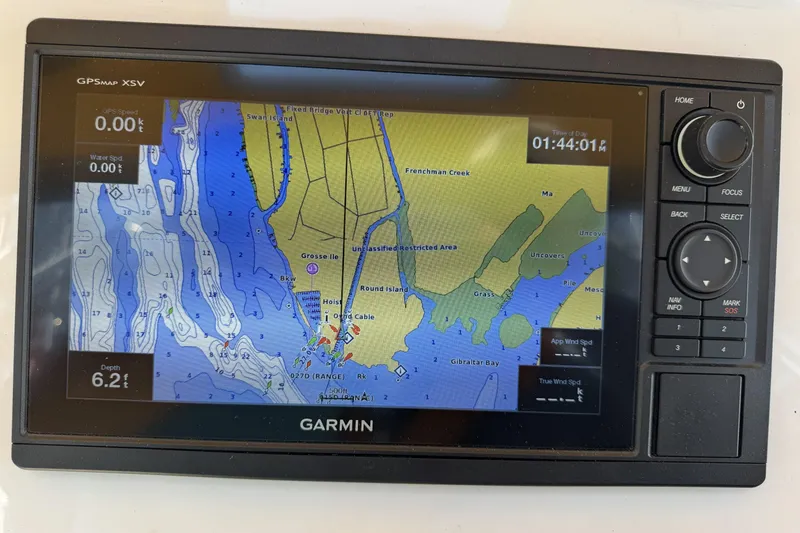 Slide: The Image of Garmin GPSmap XSV displaying nautical chart on Island Packet 32, 1994 model. - 10