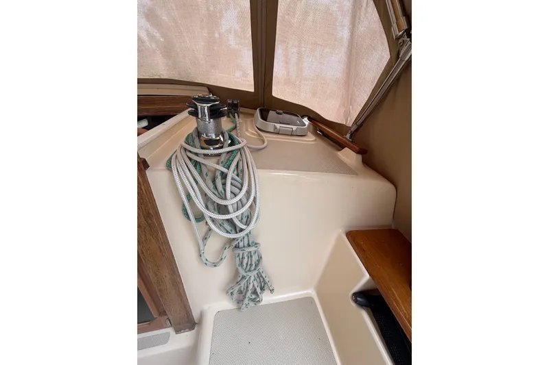 Slide: The Image of Interior of 1994 Island Packet 32 sailboat with ropes and winch. - 31