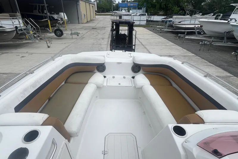Slide: The Image of 2021 Starcraft SVX 211 OB boat interior with spacious seating and cup holders. - 10