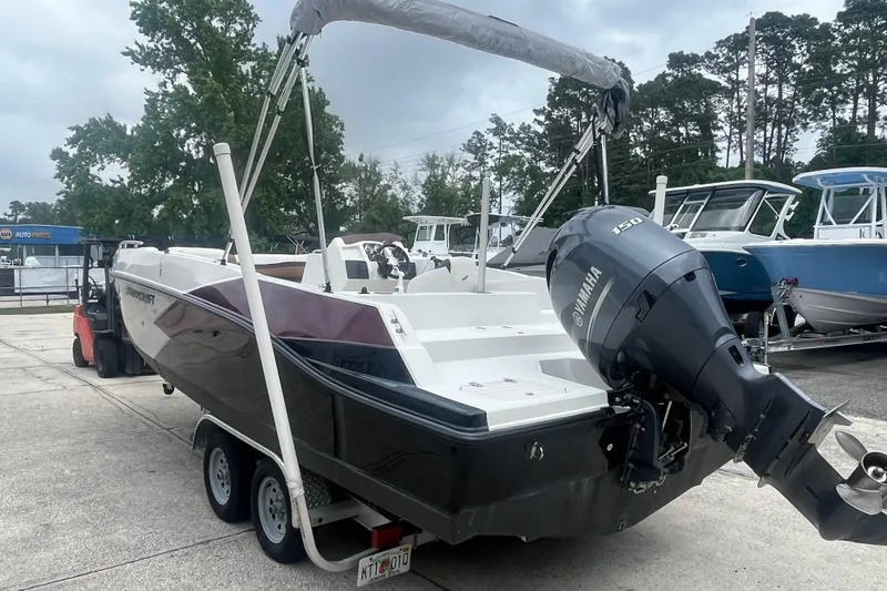 Slide: The Image of 2021 Starcraft SVX 211 OB boat with Yamaha outboard motor on trailer. - 3