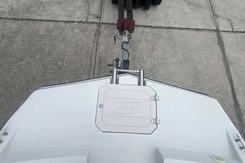 Slide: The Image of Top view of a 2021 Starcraft SVX 211 OB boat on a trailer. - 9