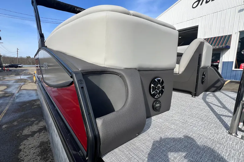Slide: The Image of 2026 Harris Sunliner 230 pontoon boat with sleek seating and modern design. - 21