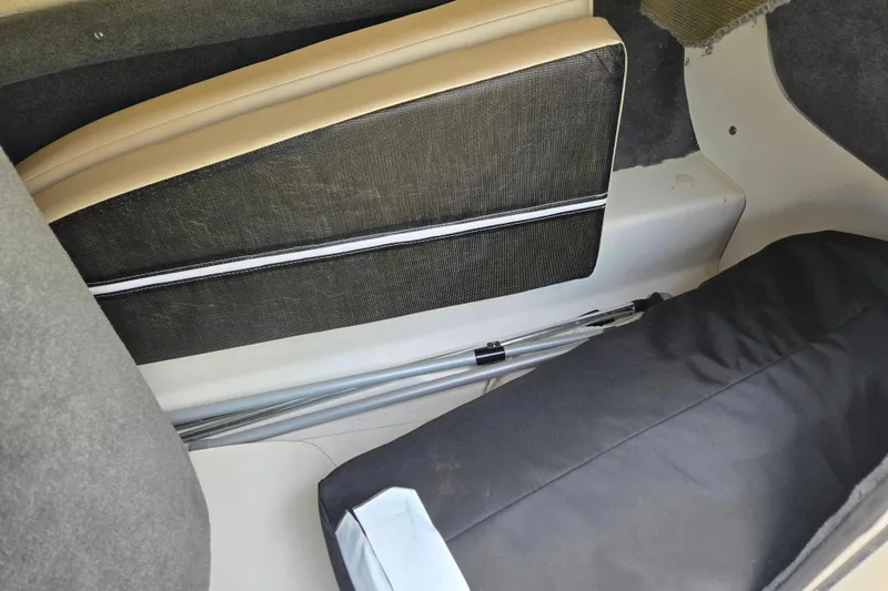 Slide: The Image of Interior storage compartment of a 2011 Sea Ray 200 Sundeck boat. - 15