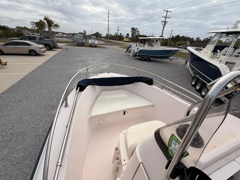 Slide: The Image of 1999 Grady-White Sportsman 180 boat in parking lot. - 11