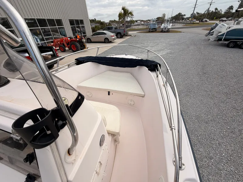 Slide: The Image of 1999 Grady-White Sportsman 180 boat on a parking lot. - 12