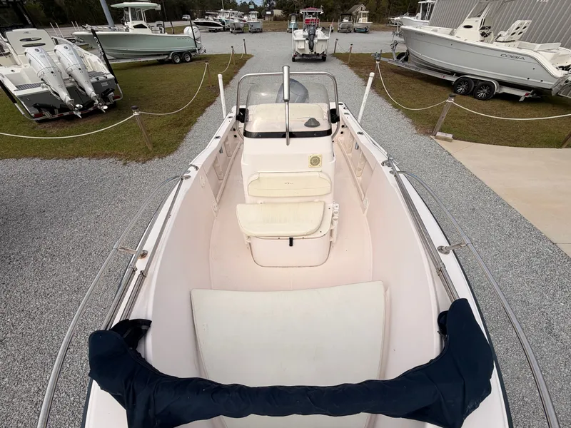 Slide: The Image of 1999 Grady-White Sportsman 180 boat on a boatyard. - 13