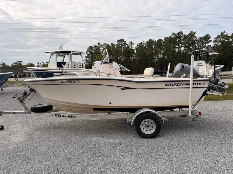 Slide: The Image of 1999 Grady-White Sportsman 180 boat on trailer, side view. - 5