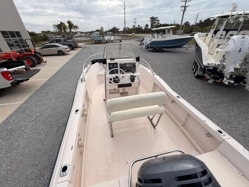 Slide: The Image of 1999 Grady-White Sportsman 180 boat displayed in parking lot. - 7