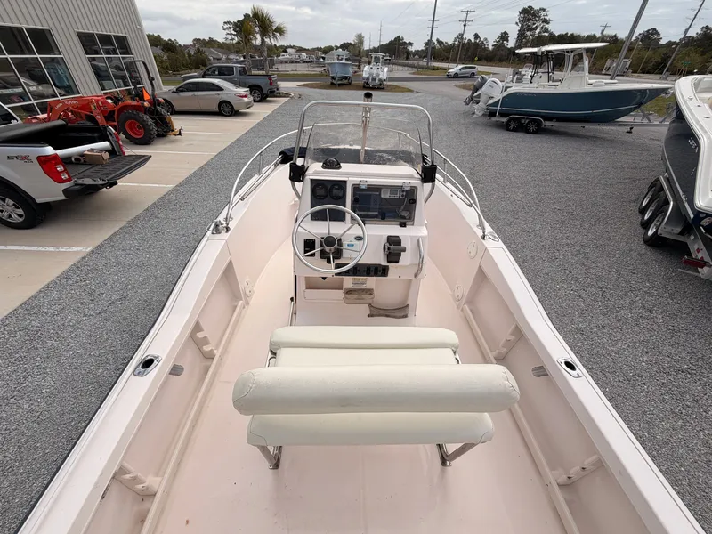 Slide: The Image of Interior view of a 1999 Grady-White Sportsman 180 boat in a parking lot. - 8