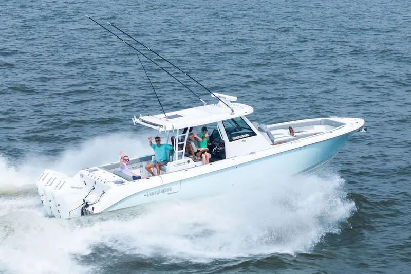 The Image of Manufacturer Provided Image: 2026 Everglades 375 Center Console boat cruising on open water with passengers. - 0