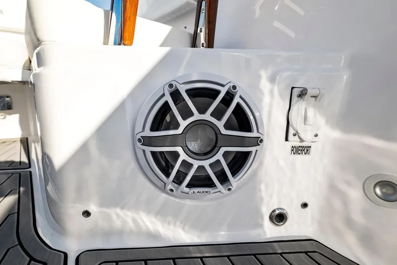 Slide: The Image of Speaker and power port on 2026 Everglades 375 Center Console boat deck. - 13
