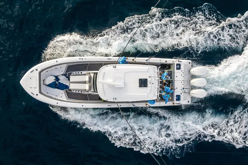 Slide: The Image of Manufacturer Provided Image: Aerial view of 2026 Everglades 375 Center Console boat cruising on open water. - 5