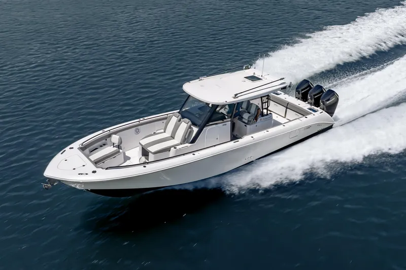 The Image of 2026 Everglades 375 Center Console boat cruising on open water. - 0