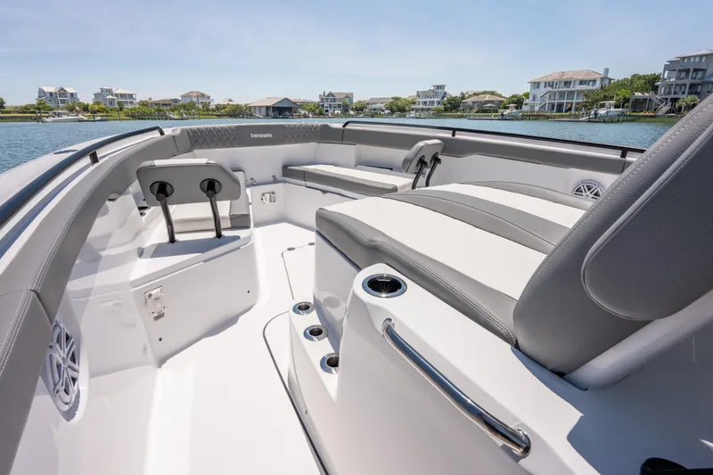 Slide: The Image of 2026 Everglades 375 Center Console boat interior with luxurious seating and waterfront view. - 20