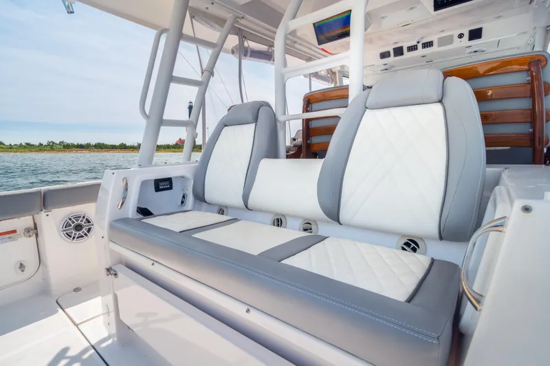 Slide: The Image of Luxury seating on 2026 Everglades 375 Center Console boat, featuring elegant design and comfort. - 8