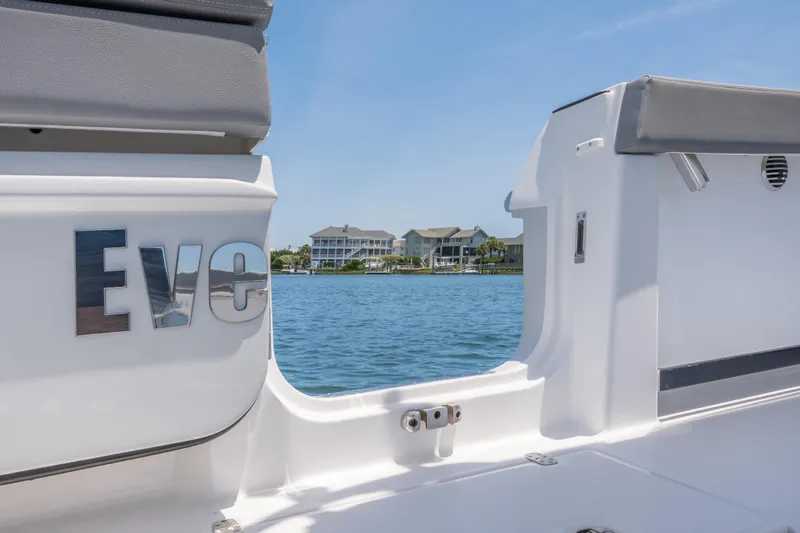 Slide: The Image of 2026 Everglades 375 Center Console boat with waterfront view. - 19