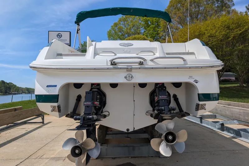 Slide: The Image of Rear view of a 2000 Cobalt 292 boat with dual propellers on a sunny day. - 4