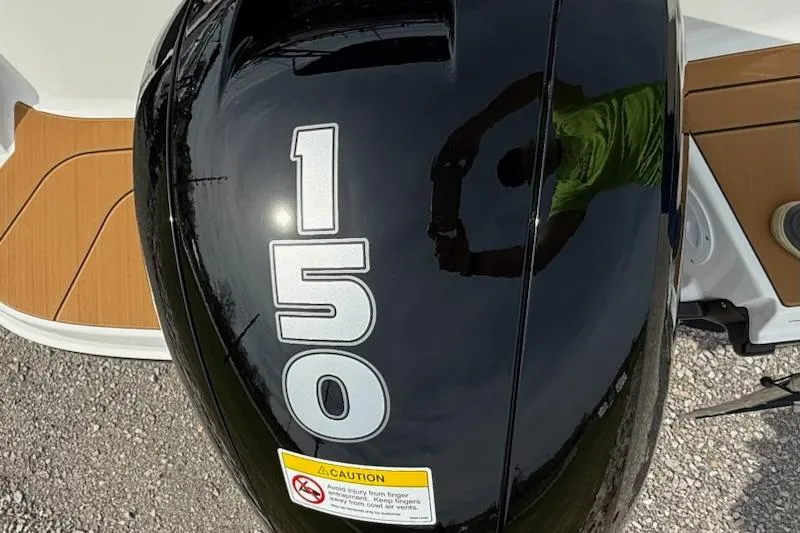 Slide: The Image of Bayliner V20 2026 boat with 150 horsepower engine, close-up view. - 5