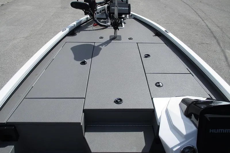 Slide: The Image of 2021 Vexus AVX 1980 boat deck with storage compartments and fishing equipment. - 13