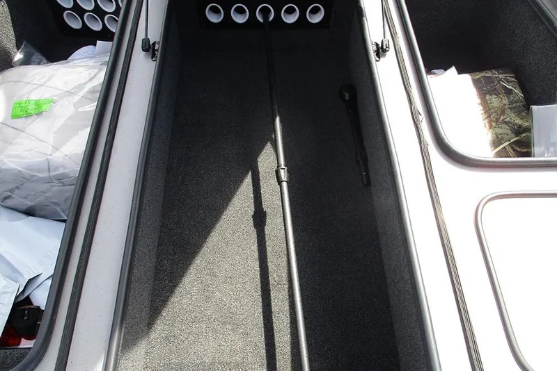 Slide: The Image of 2021 Vexus AVX 1980 boat storage compartment with organized interior layout. - 16