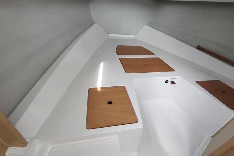 Slide: The Image of Interior view of 2023 RYCK 280 boat with wooden hatches and sleek design. - 46