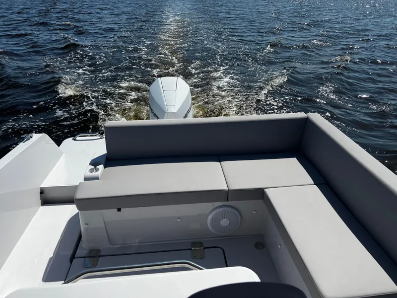 Slide: The Image of RYCK 280 boat 2023 on calm water with gray seating. - 58
