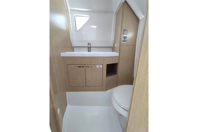 Slide: The Image of Modern bathroom interior of 2023 RYCK 280 boat, featuring sleek sink and toilet. - 52