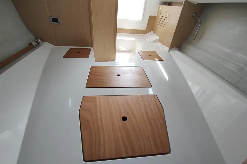 Slide: The Image of Interior view of 2023 RYCK 280 boat with wooden panels and modern design. - 51