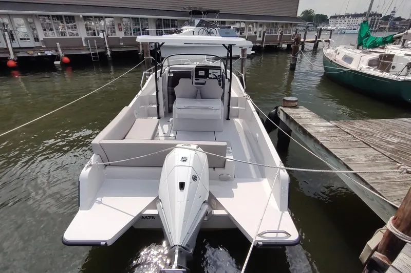 Slide: The Image of 2023 RYCK 280 boat docked at marina, showcasing sleek design and modern features. - 9