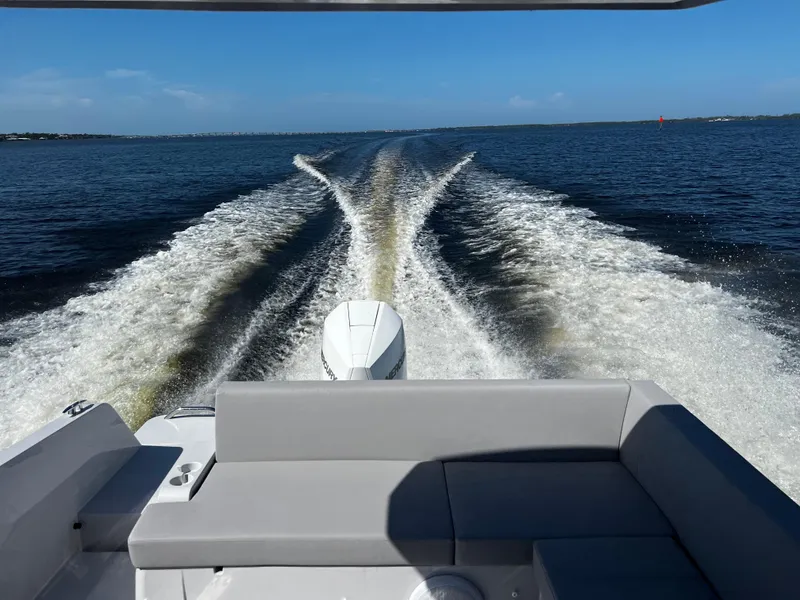 Slide: The Image of RYCK 280 boat 2023 on open water, rear view. - 59