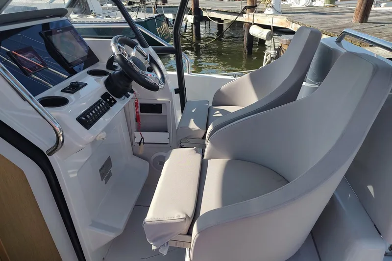 Slide: The Image of Interior of 2023 RYCK 280 boat with modern helm and comfortable seating. - 20