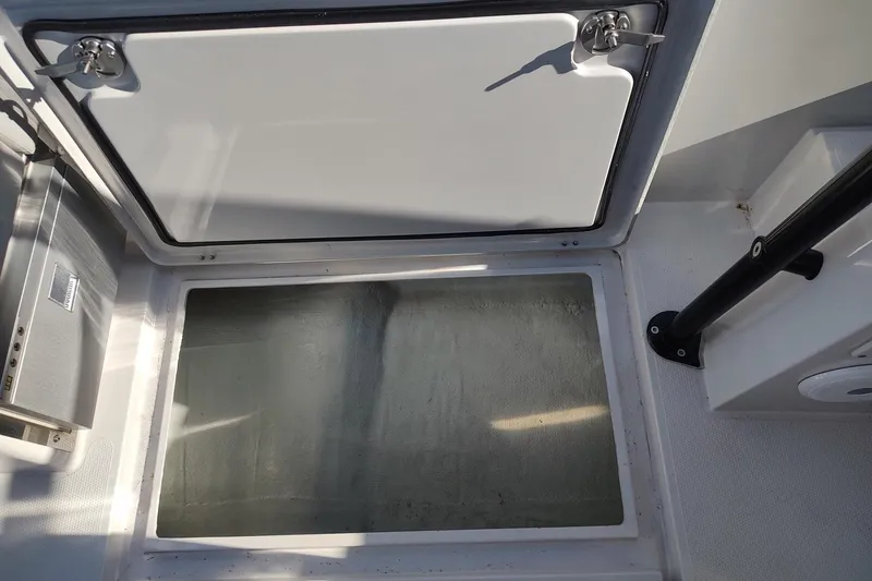 Slide: The Image of Hatch and storage compartment on 2023 RYCK 280 boat deck. - 27