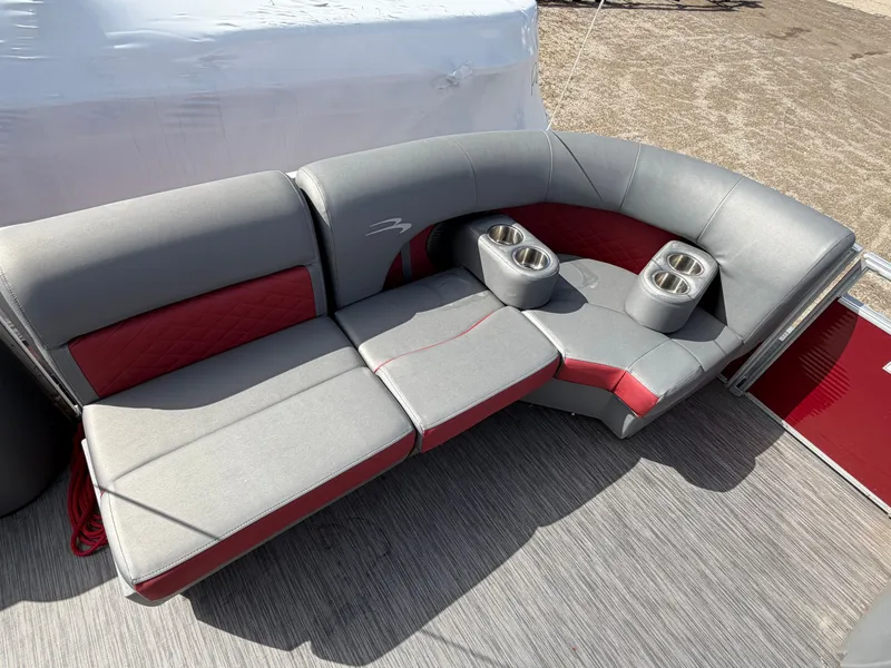 Slide: The Image of Bennington 20 LSB 2022 boat seating with cup holders, gray and red. - 4