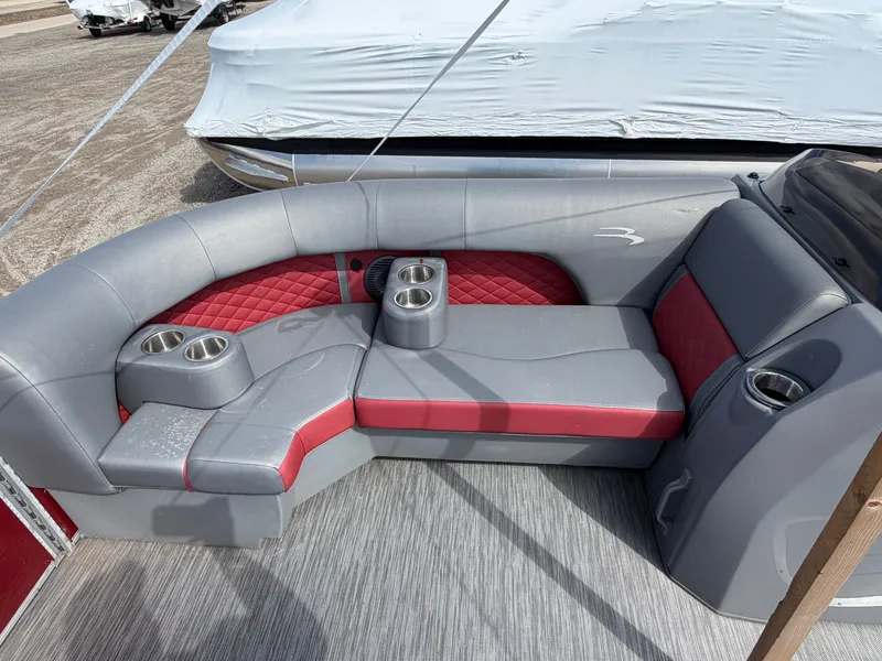 Slide: The Image of Interior of a 2022 Bennington 20 LSB with gray and red seating. - 5