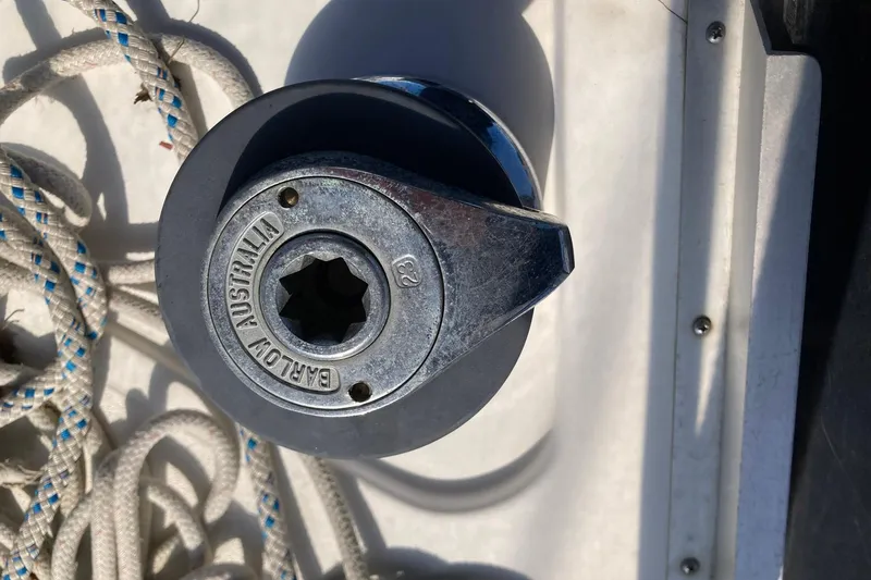 Slide: The Image of Winch handle on 1987 Hunter Legend 35 sailboat, featuring Barlow Australia branding. - 14