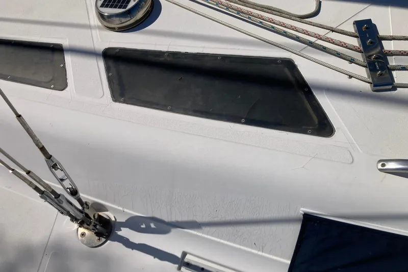 Slide: The Image of Close-up of 1987 Hunter Legend 35 sailboat deck with rigging and fittings. - 16