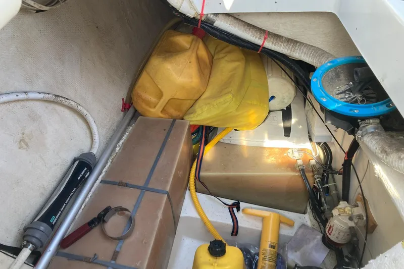 Slide: The Image of Interior of a 1987 Hunter Legend 35 sailboat showing storage and equipment. - 31