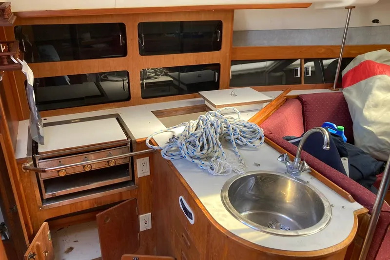 Slide: The Image of Interior of 1987 Hunter Legend 35 sailboat with kitchen sink and stove. - 34