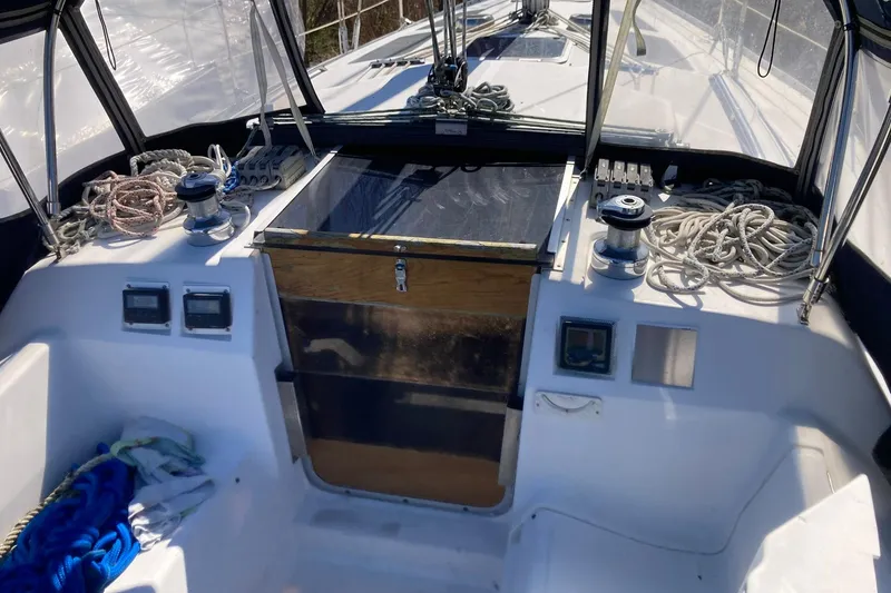 Slide: The Image of Cockpit of 1987 Hunter Legend 35 sailboat with ropes and winches. - 7