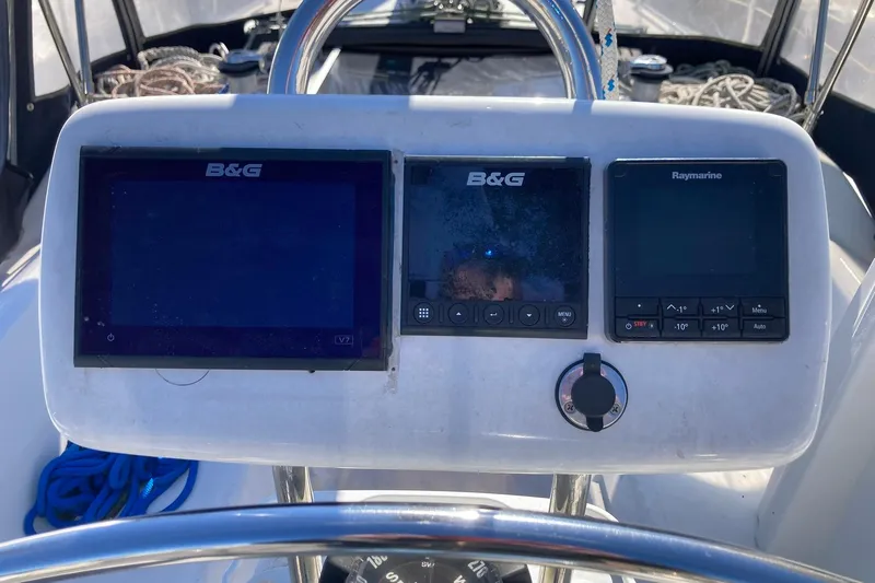 Slide: The Image of Navigation instruments on a 1987 Hunter Legend 35 sailboat dashboard. - 9